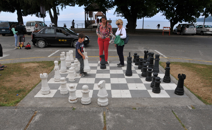 Enjoying a chessboard painted on the ground