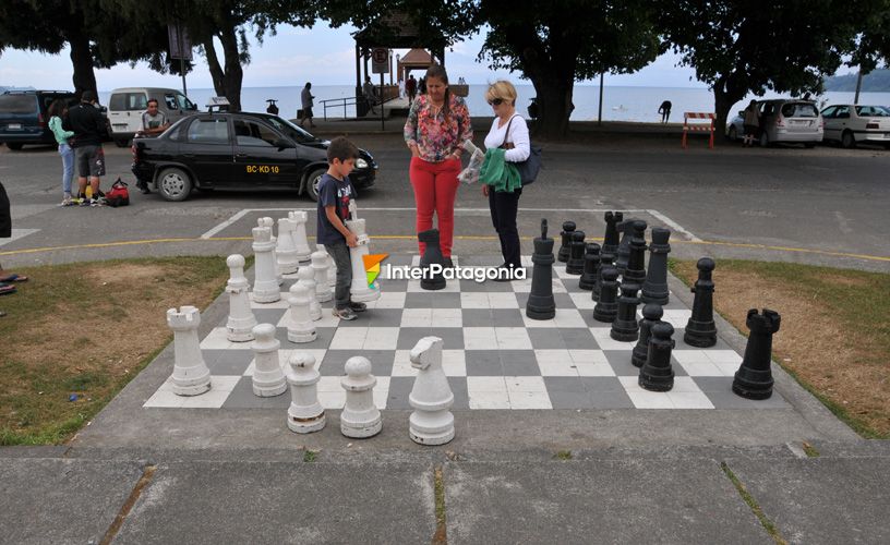 Enjoying a chessboard painted on the ground